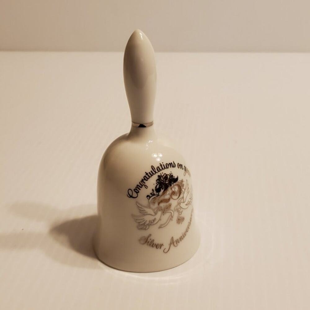 Congratulations on your Silver Anniversary Porcelain Bell. Made in Japan